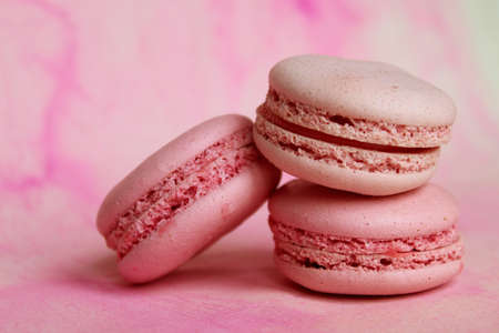 Beautiful template with pink macaroon on pink background for design.の写真素材