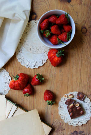 Strawberries and chocolate. Vintage style. Desktop wallpaper.の写真素材