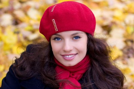 Girl with red roses in smilesの写真素材