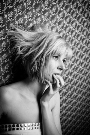 Image of a beautiful blonde in tearsの写真素材