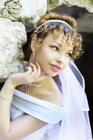 Picture of beautiful curly bride in the park.の写真素材