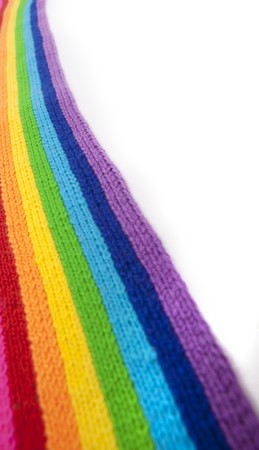 The image of a bright rainbow knitted scarfの写真素材