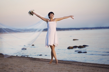 The image of a bride on the beachの写真素材