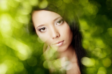 The image of the girl in the green glowの写真素材