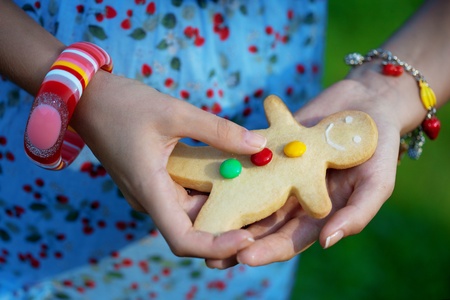 Woman with cookies  man in the hands of