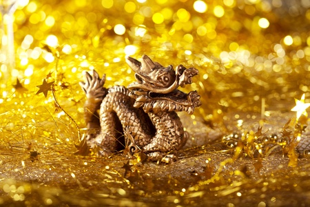 Dragon symbol of the year 2012 on a bright background bokehの写真素材