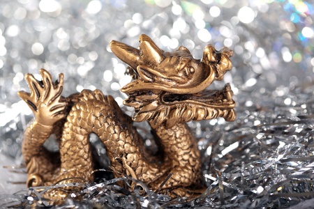 Dragon symbol of the year 2012 on a bright background bokehの写真素材