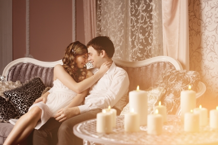 Happy Couple in love hugs at home
の写真素材