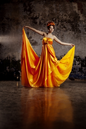 Luxury lady in long silk dressの写真素材