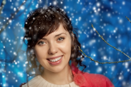 Beauty young woman in winter forestの写真素材