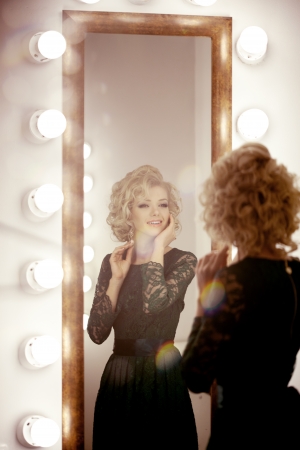 Beauty luxury woman with  and mirrorの写真素材