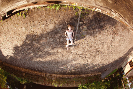 Beautiful stylish woman in the villageの写真素材