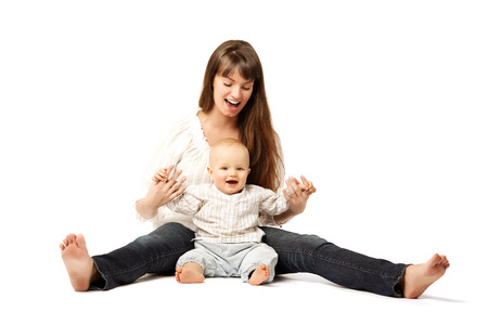 Kid with his young mother. Mom with baby in her arms. Family hug. Baby and his mum.