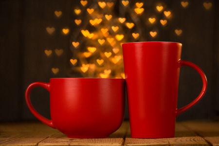 Cozy delicious cup with hearts. Romantic picture. Postcard to the day of St. valenitna.の写真素材
