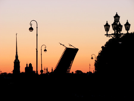 Saint-Petersburg, Russia. White Nights, silhouette Peter and Paul Fortress and divorced bridges.の写真素材