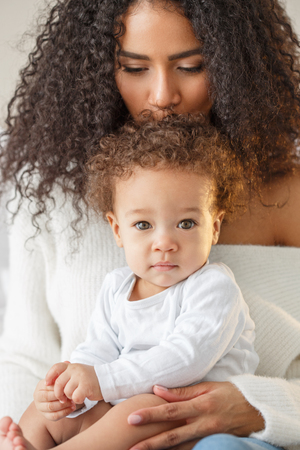 Love of a mother and baby. Family at home. Lifestyleの写真素材