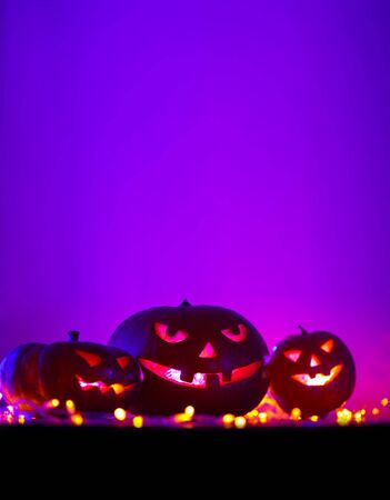 Halloween Pumpkin  In A Spooky Mystic Night On Wooden backgroundの写真素材