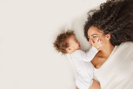 Love of a mother and child, baby. Family at home. Lifestyleの写真素材