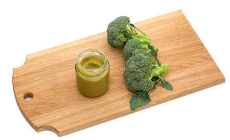 Broccoli as baby food. Healthy vitamins in vegetables. Fresh green complementary foods.の写真素材