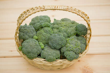 Broccoli in a basket. Green harvest of fresh vegetables.の写真素材
