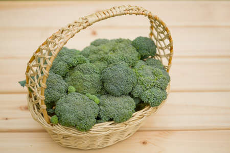 Broccoli in a basket. Green harvest of fresh vegetables.の写真素材