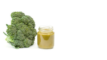 Broccoli as baby food. Healthy vitamins in vegetables. Fresh green complementary foods.の写真素材