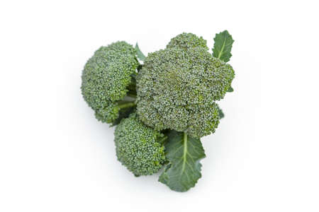 Broccoli on a white background. Green harvest of fresh vegetables. healthy vegetarian foodの写真素材
