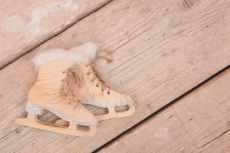 Wooden decoration skates on a scaffolding woodの写真素材