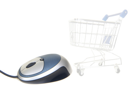 Online shopping concept with a mouse and shopping cart on a white backgroundの写真素材