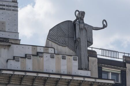 Vienna, Austria - June 5, 2019; Statue on top of the postal savings bank a famous building in...