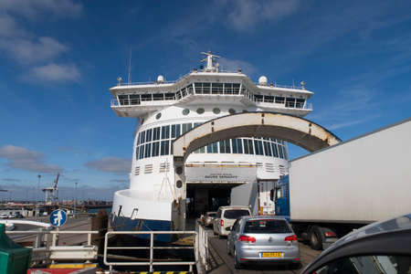 Calais, France - June 23, 2017; Cars embarking on the Dover Seaways a ship crossing the channel from France to England, from Calais to Dover.のeditorial素材