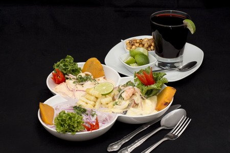 Peru Dish: 3 types of Cebiche ceviche with chicha drink, lemon and canchita.の写真素材