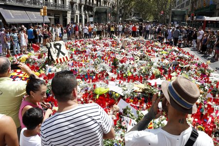 BARCELONA/SPAIN - 21 AUGUST 2017: People reunited on Barcelona's Rambla, where 17th of August 2017 has been a terrorist attack, giving tribute to the at least 15 fatal victims and over 120 injuredのeditorial素材