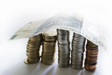 Pillar of coins with roof of banknotes