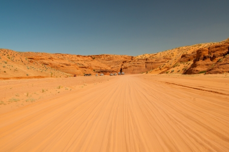 Unpaved road to Upper Antelope Canyon, Page, Arizona within the Navajo Indian Reservation on a hot summer dayの写真素材