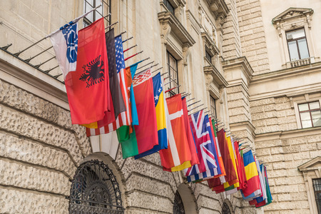 International set of flags at the Hofburg palace in Vienna, Austriaのeditorial素材