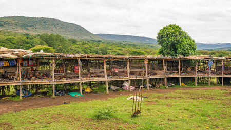 MASAI MARA, KENYA - OCTOBER 17, 2014: African market offering traditional handmade accessories from the Maasai people. The Maasai live in southern Kenya and northern Tanzania.のeditorial素材