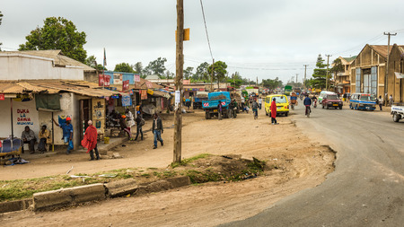 ARUSHA, TANZANIA - OCTOBER 21, 2014 : Typical street scene in Arusha. Arusha is located below Mount Meru in the eastern branch of the Great Rift Valley and the capital of the Arusha Region.のeditorial素材
