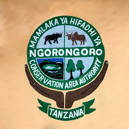 NGORONGORO, TANZANIA - OCTOBER 21, 2014 : Welcome sign at the entry of the Ngorongoro conservation area. Ngorongoro Crater is a large volcanic caldera and a wildlife reserve.のeditorial素材