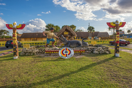 MIAMI, FLORIDA - JANUARY 13, 2015 : Entry to the Miccosukee Indian Village. The Miccosukee Tribe is a federally recognized Indian Tribe residing in the Florida Everglades west of Miami.のeditorial素材