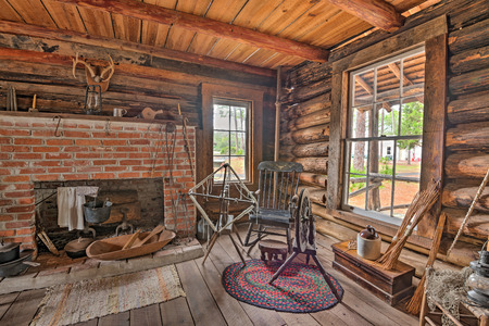 LARGO, FLORIDA - JANUARY 14, 2015 : Interior of the historic McMullen-Coachman Log House in the Pinellas County Heritage Village. It is a typical Florida "Cracker" log home of the pioneer period.のeditorial素材