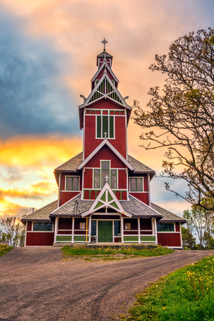 Sunrise above Buksnes Church in the village of Gravdal, Lofoten islands, Norway. Hdr processed.のeditorial素材