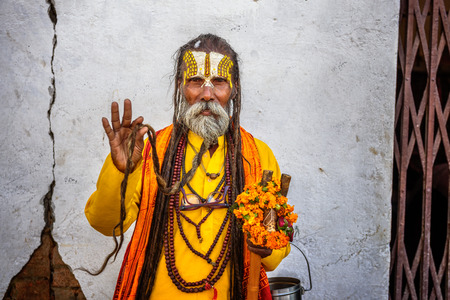KATHMANDU, NEPAL - OCTOBER 20, 2015 : Wandering  Shaiva sadhu (holy man) shows his long beardのeditorial素材