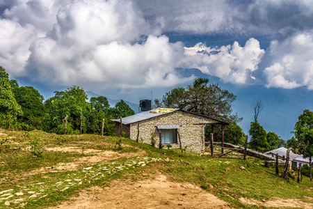 Old stone cabin under Annapurna mountain  in the Himalayas in Nepalの写真素材