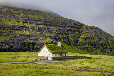 Small village church in Saksun on the island of Streymoy, Faroe Islands, Denmarkの写真素材