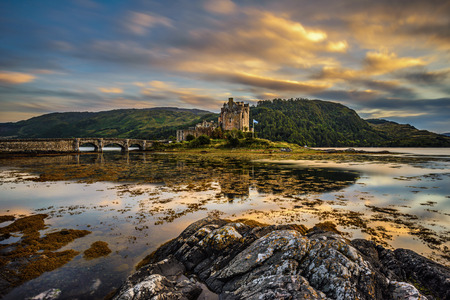 Sunset over Eilean Donan Castle, Scotland, United Kingdom. Long exposure.の写真素材