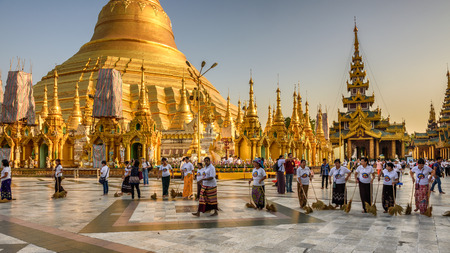YANGON, MYANMAR - JANUARY 18, 2016 : Charwomen working at the Shwedagon Pagoda Temple.のeditorial素材