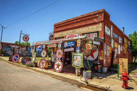 ERICK, OKLAHOMA, USA - MAY 12, 2016 : Sandhills Curiosity Shop located in Erick's oldest building - the City Meat Market. It is a large collection of crazy Route 66 memorabilia.のeditorial素材