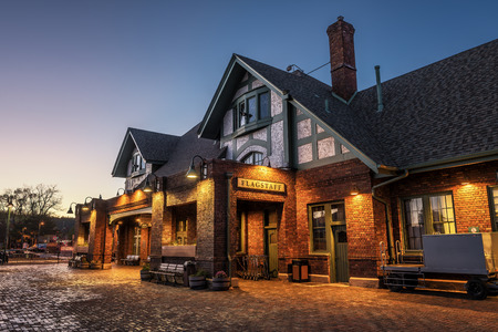 FLAGSTAFF, ARIZONA, USA - MAY 16, 2016 : Historic train station in Flagstaff at sunset. It is located on Route 66 and is formerly known as Atchison, Topeka and Santa Fe Railway depot. Hdr processed.のeditorial素材