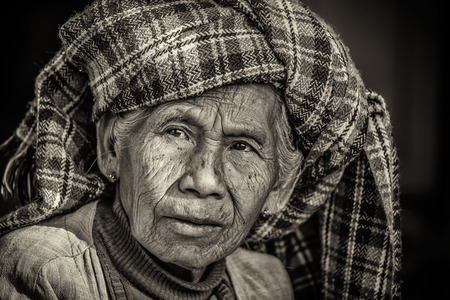 PINDAYA, MYANMAR - JANUARY 25, 2016 : Black and white portrait of an old indigenous woman in Myanmarのeditorial素材